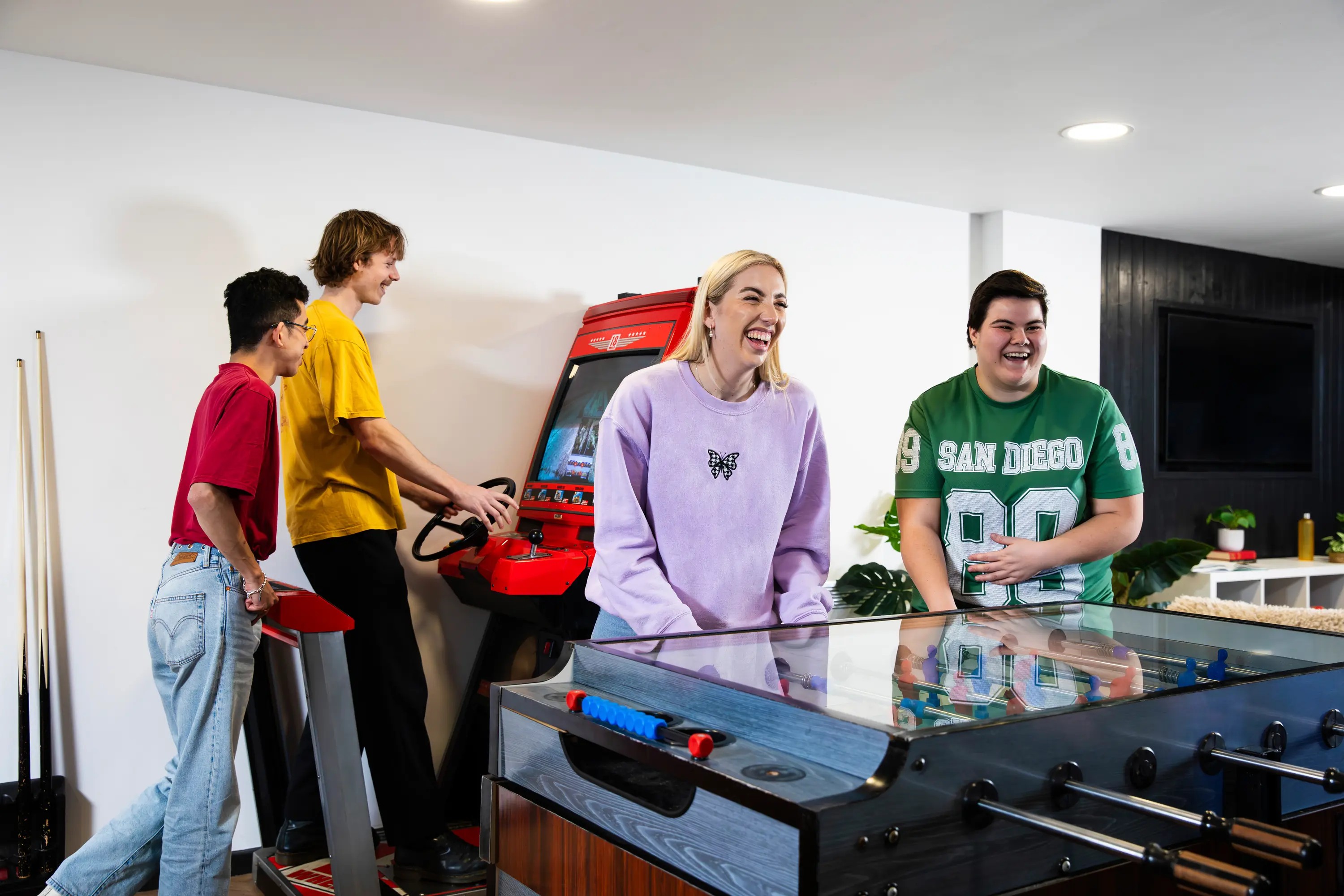 Students playing in the games area