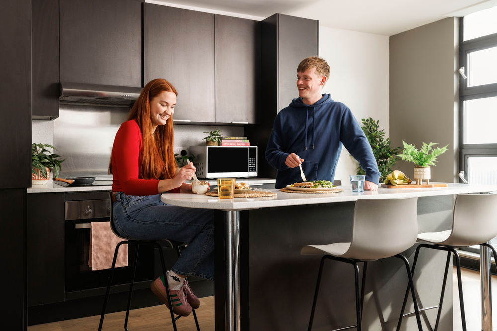 Students in a shared kitchen