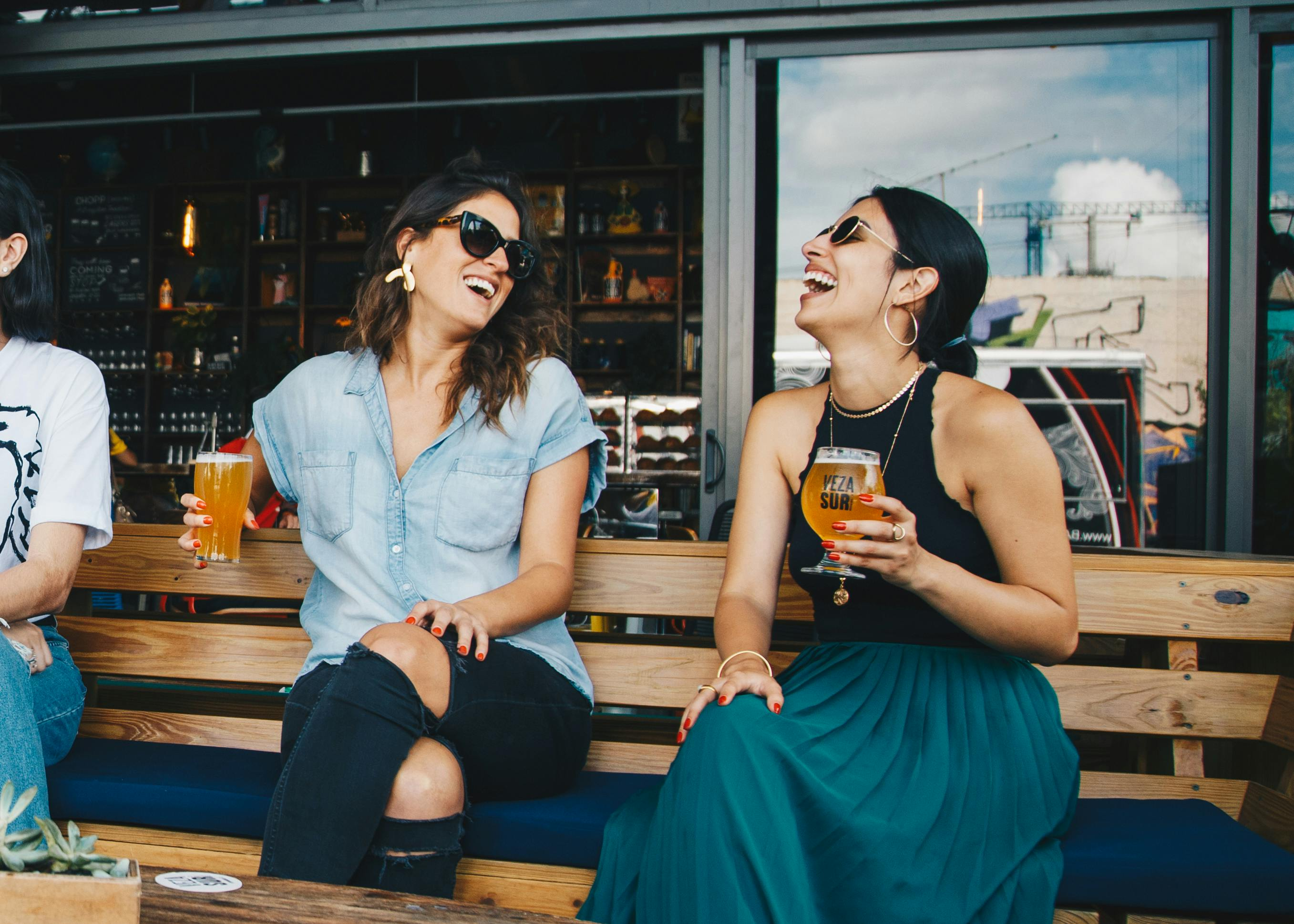 Photo of two friends drinking beer