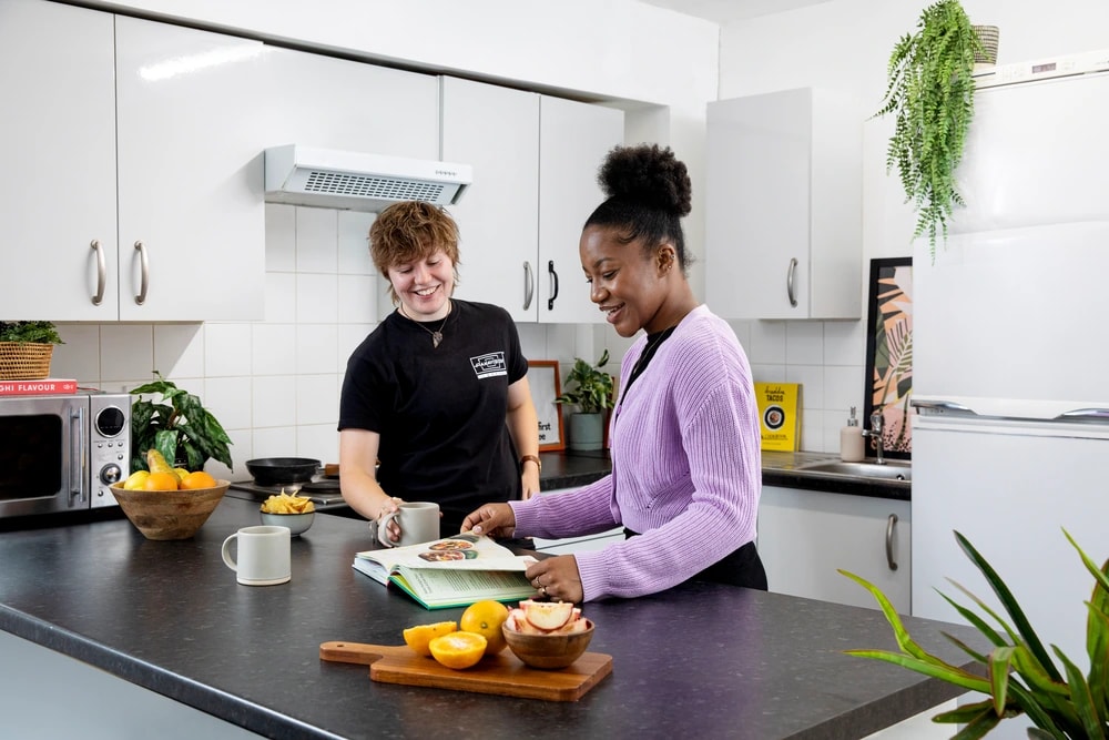 Students in a shared kitchen