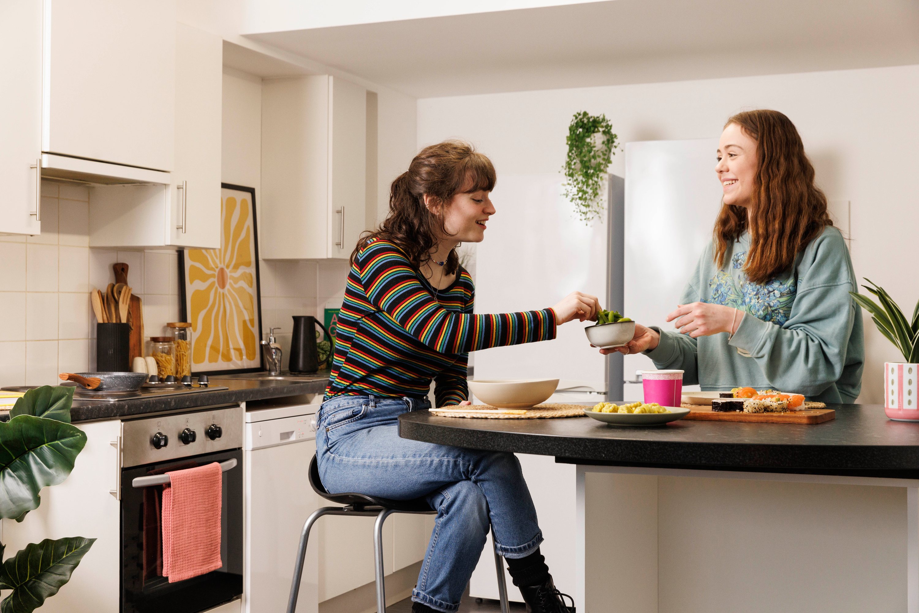 Students in a shared kitchen