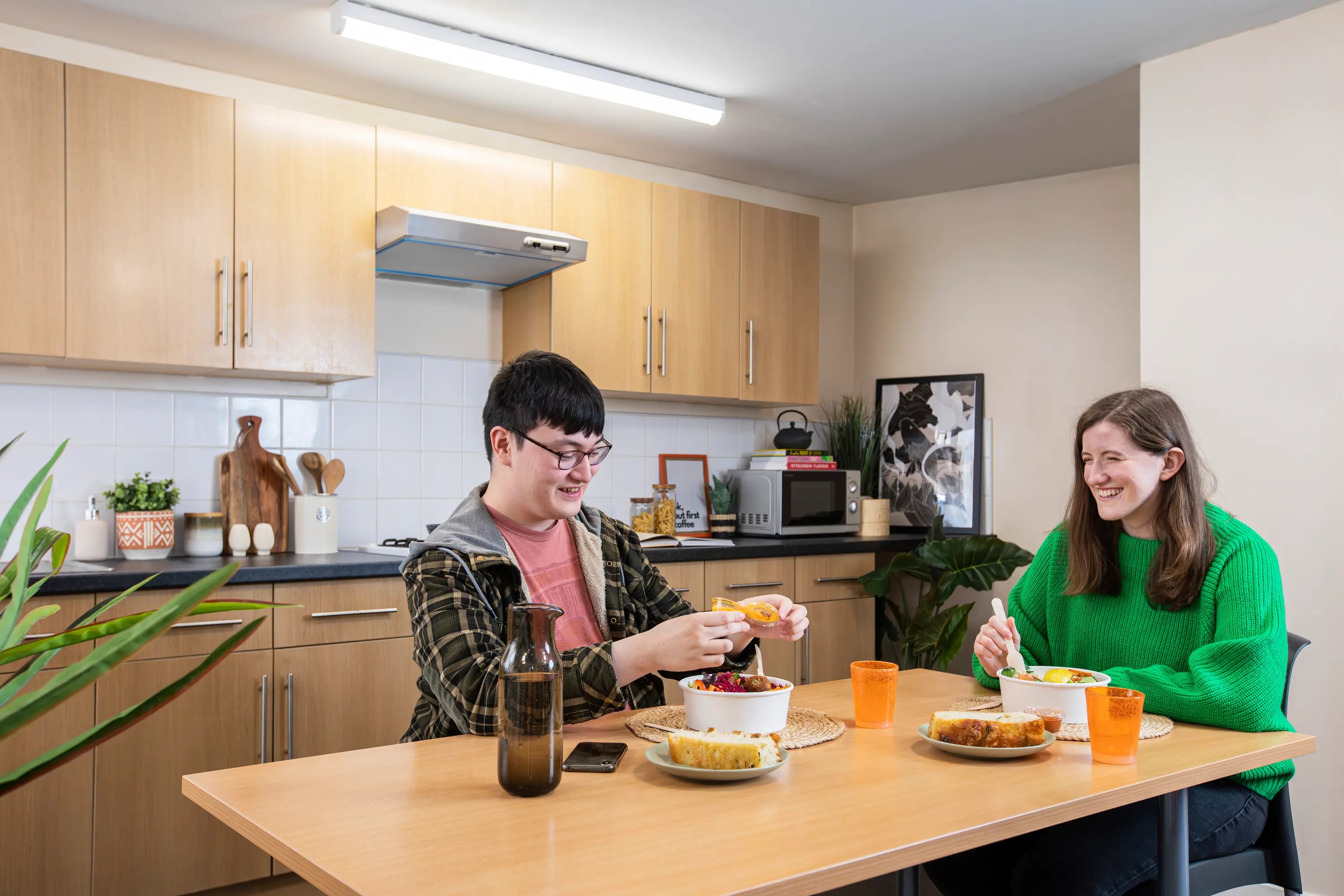 Students in a shared kitchen