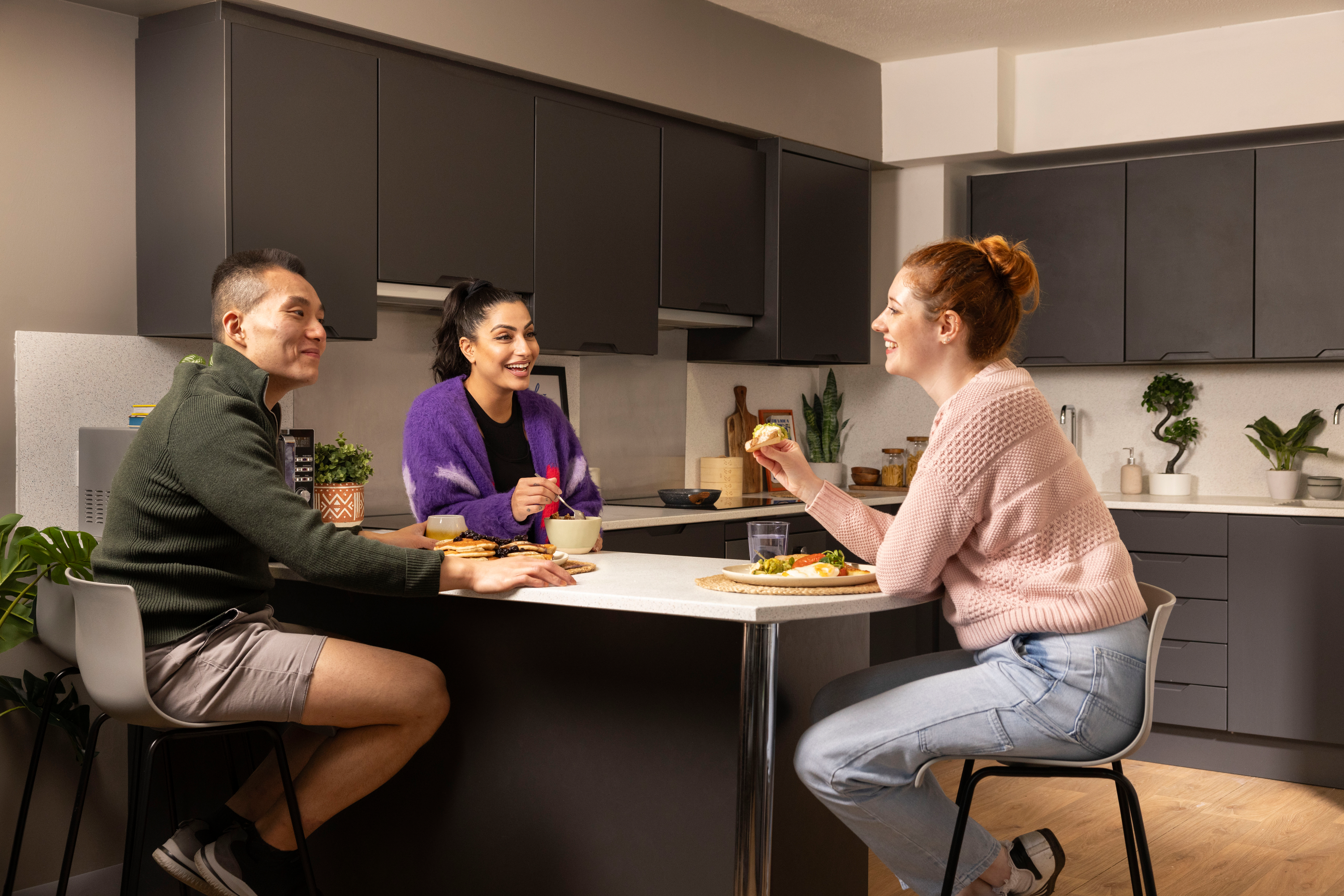 Students in a shared kitchen