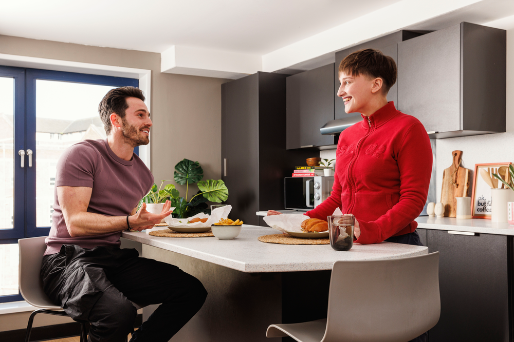 Students in a shared kitchen