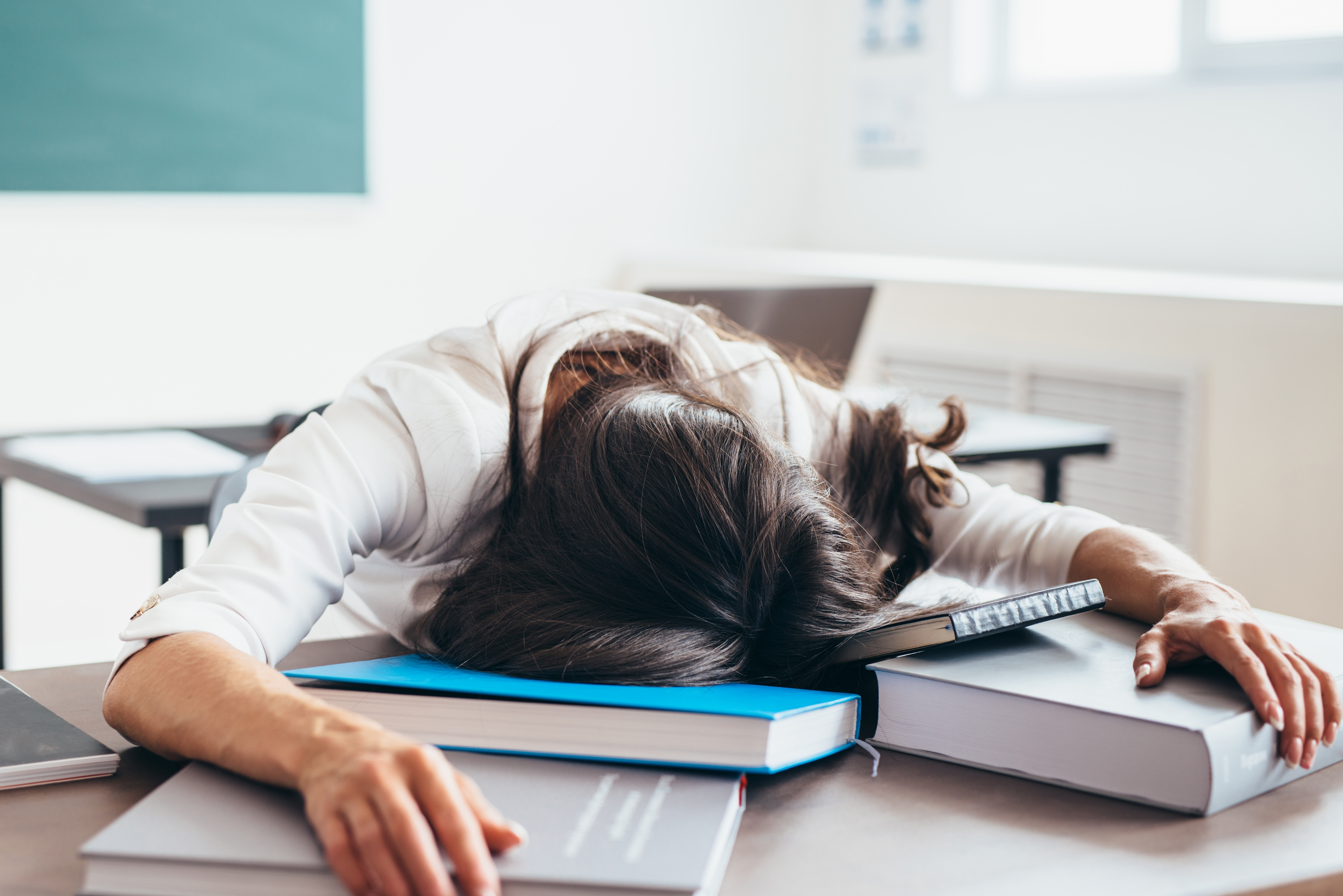 Female student asleep on the desk