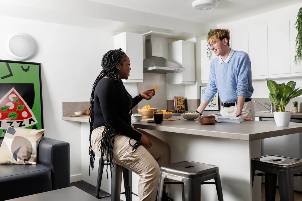 Students in a shared kitchen