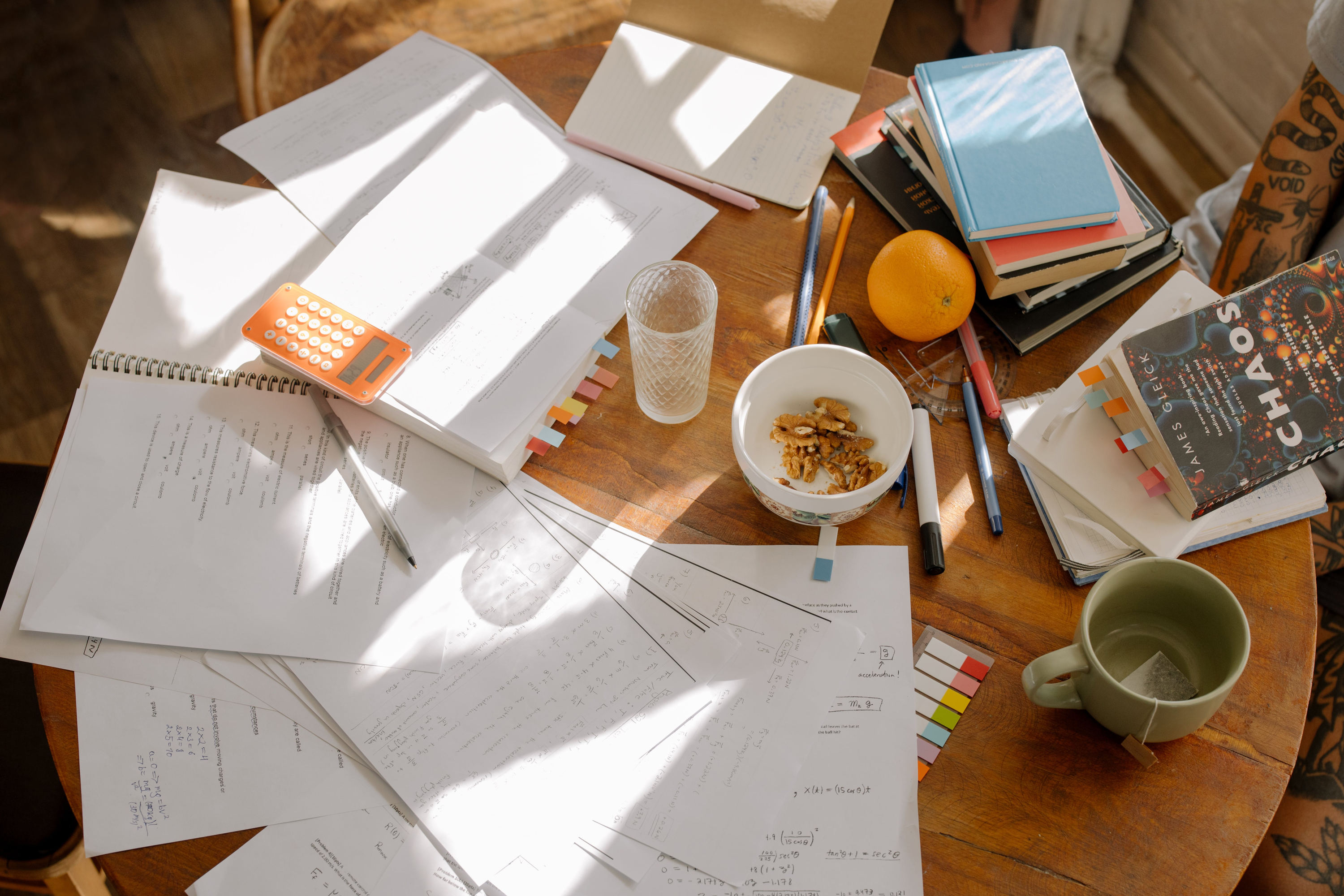 Notebooks and work materials on desk