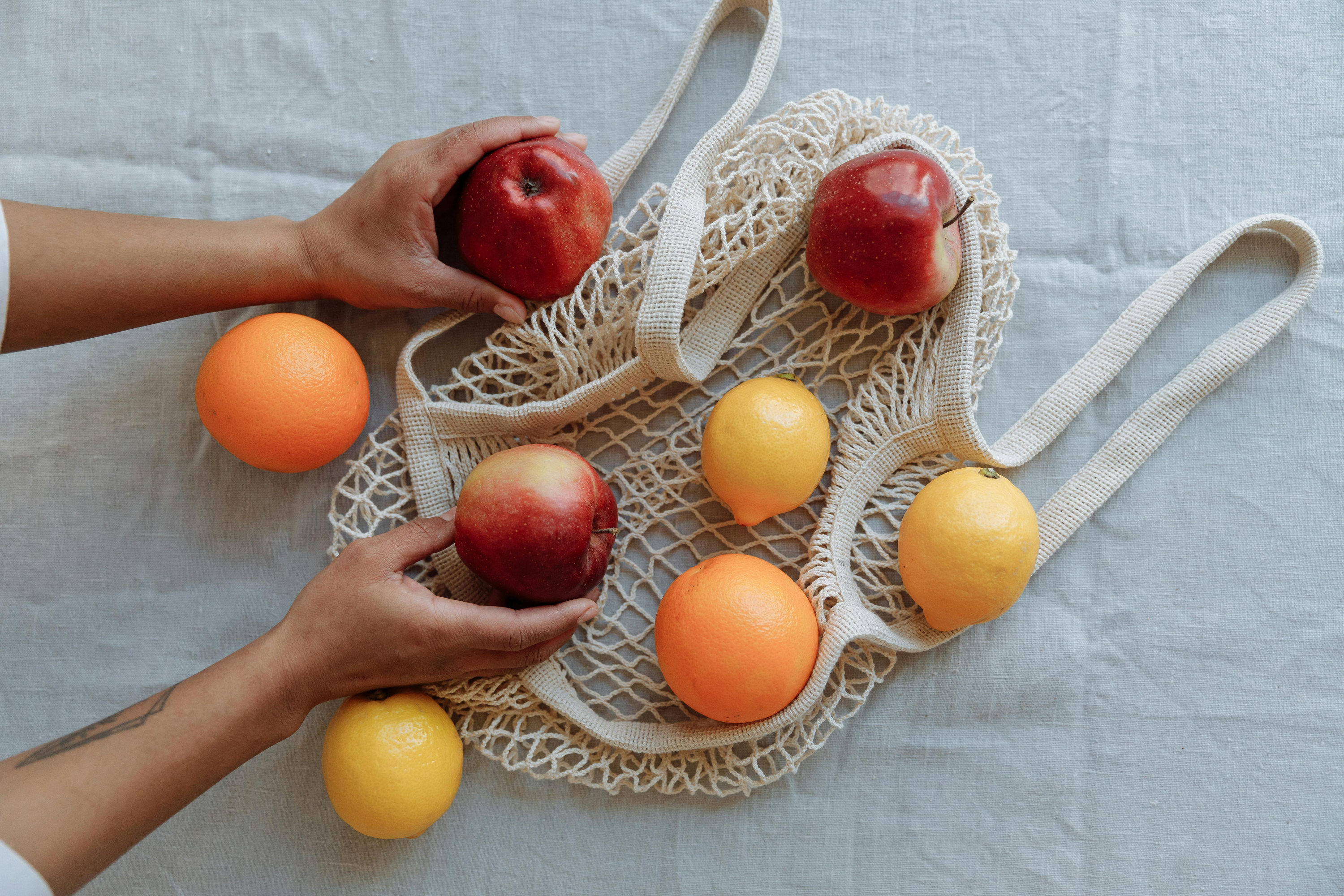 String bag with fruit in it