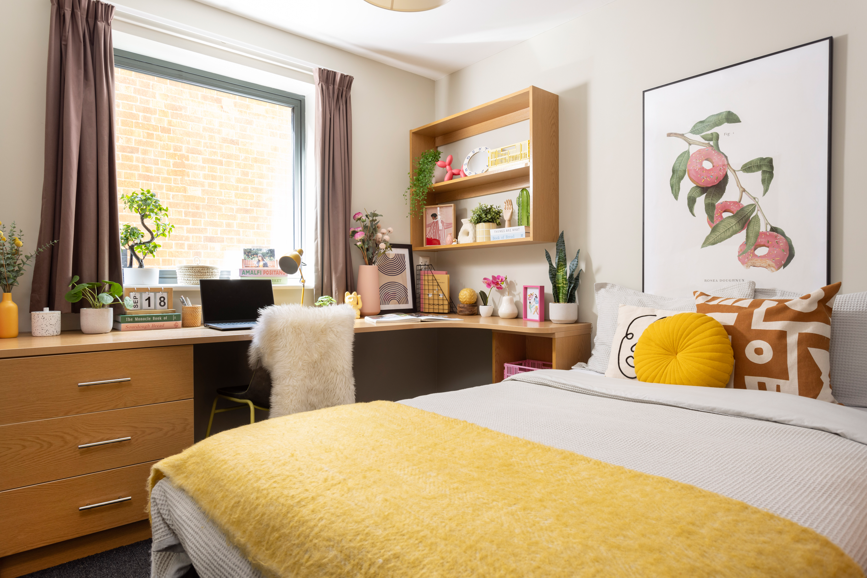 Bed and study space in an En-suite room