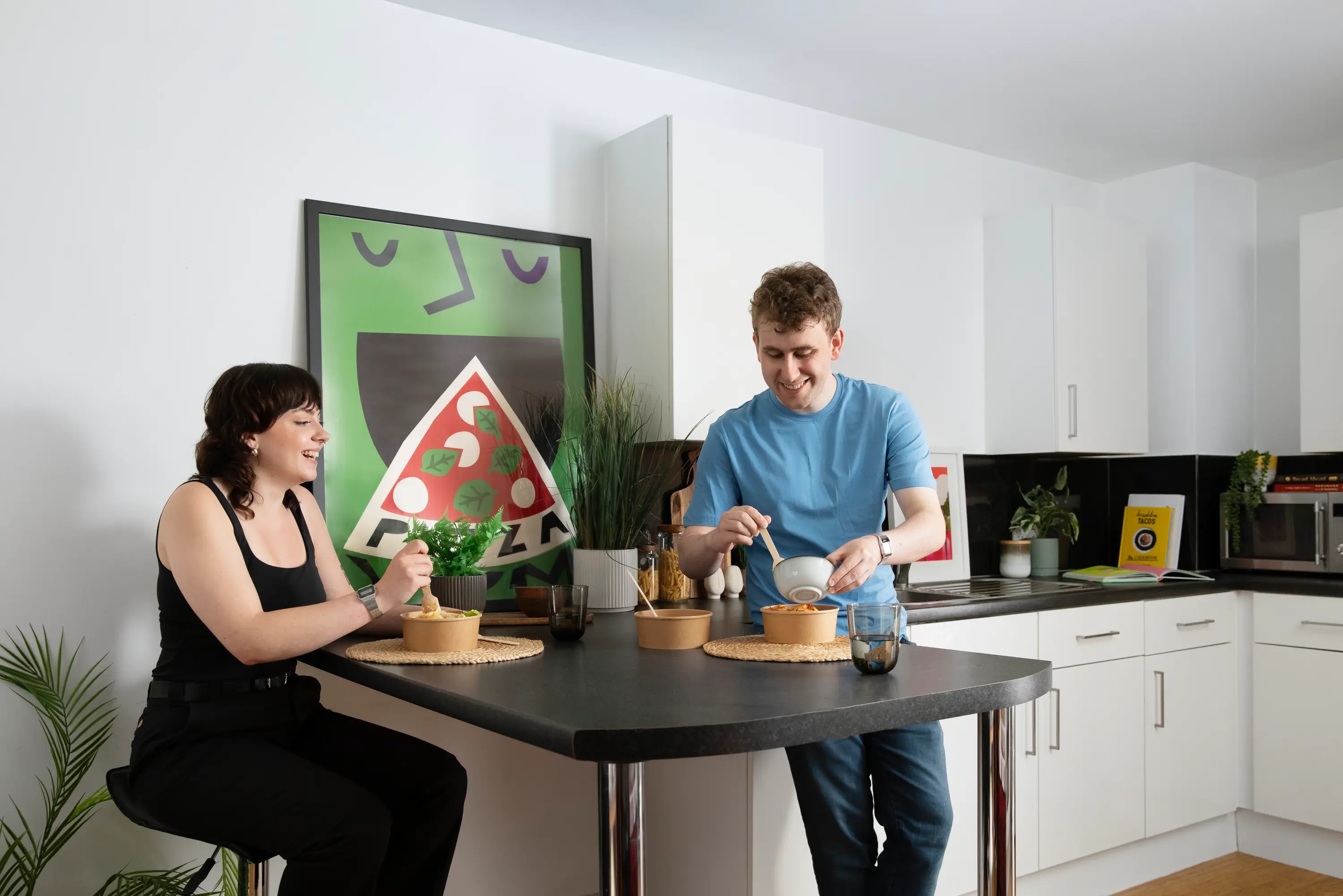 Students in a shared kitchen