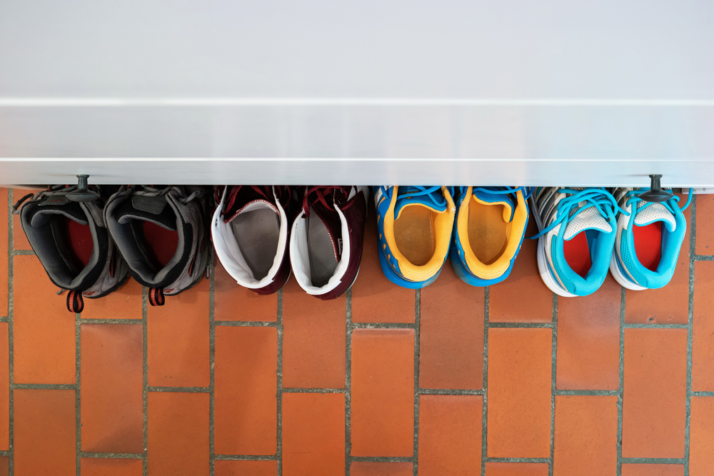 Shoes tidied away in hallway