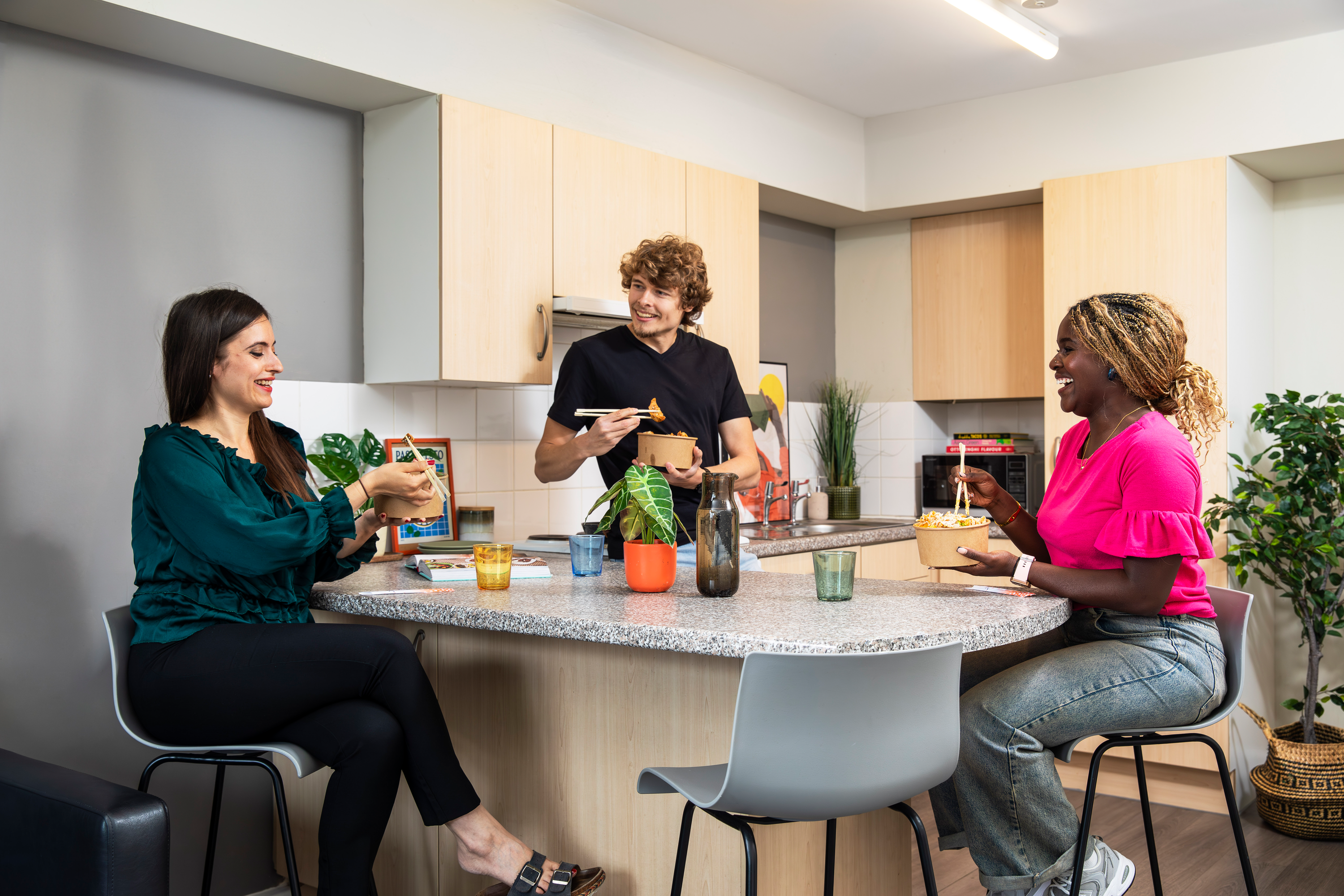 Students in a shared kitchen