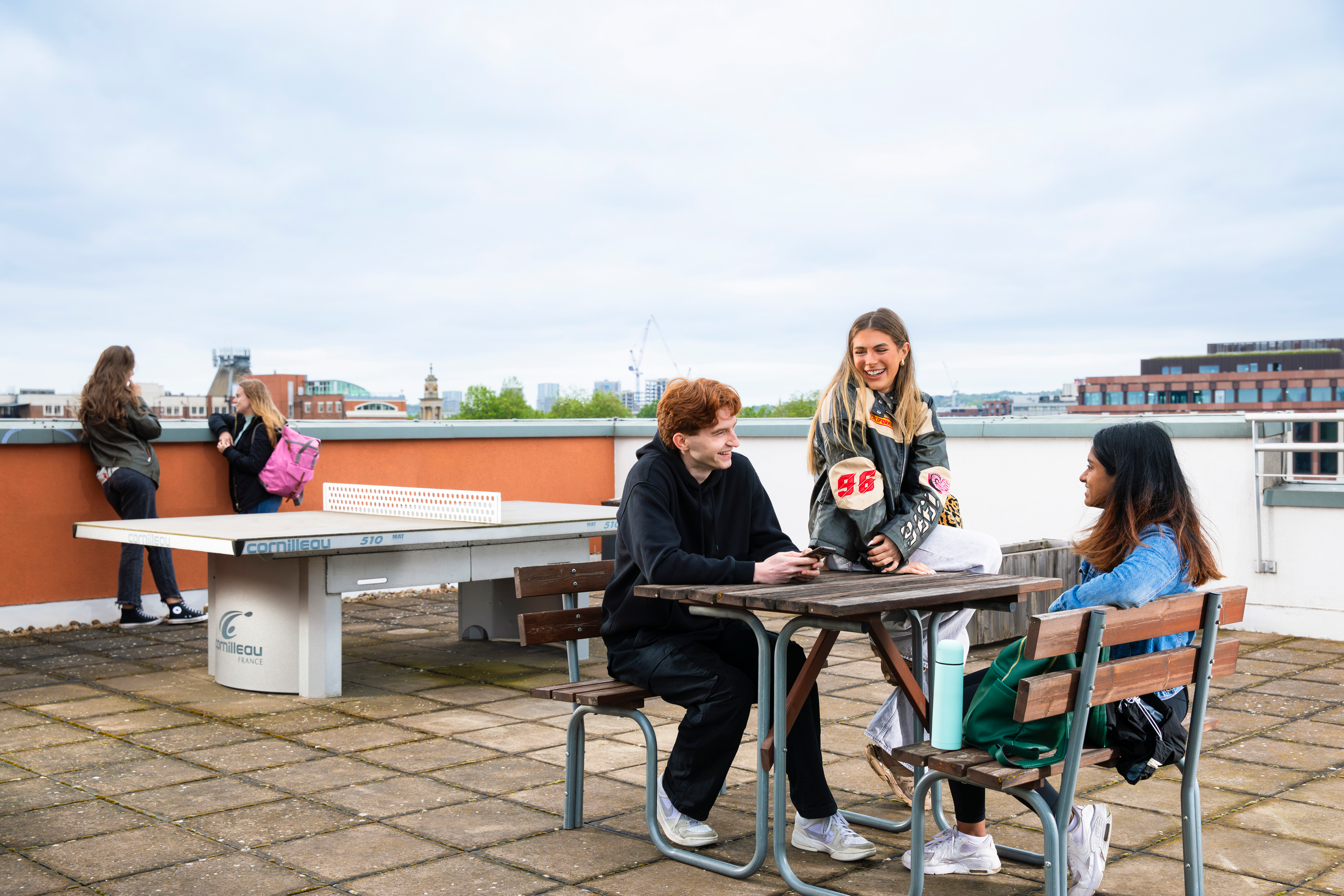 Students on rooftop at Beaumont Court