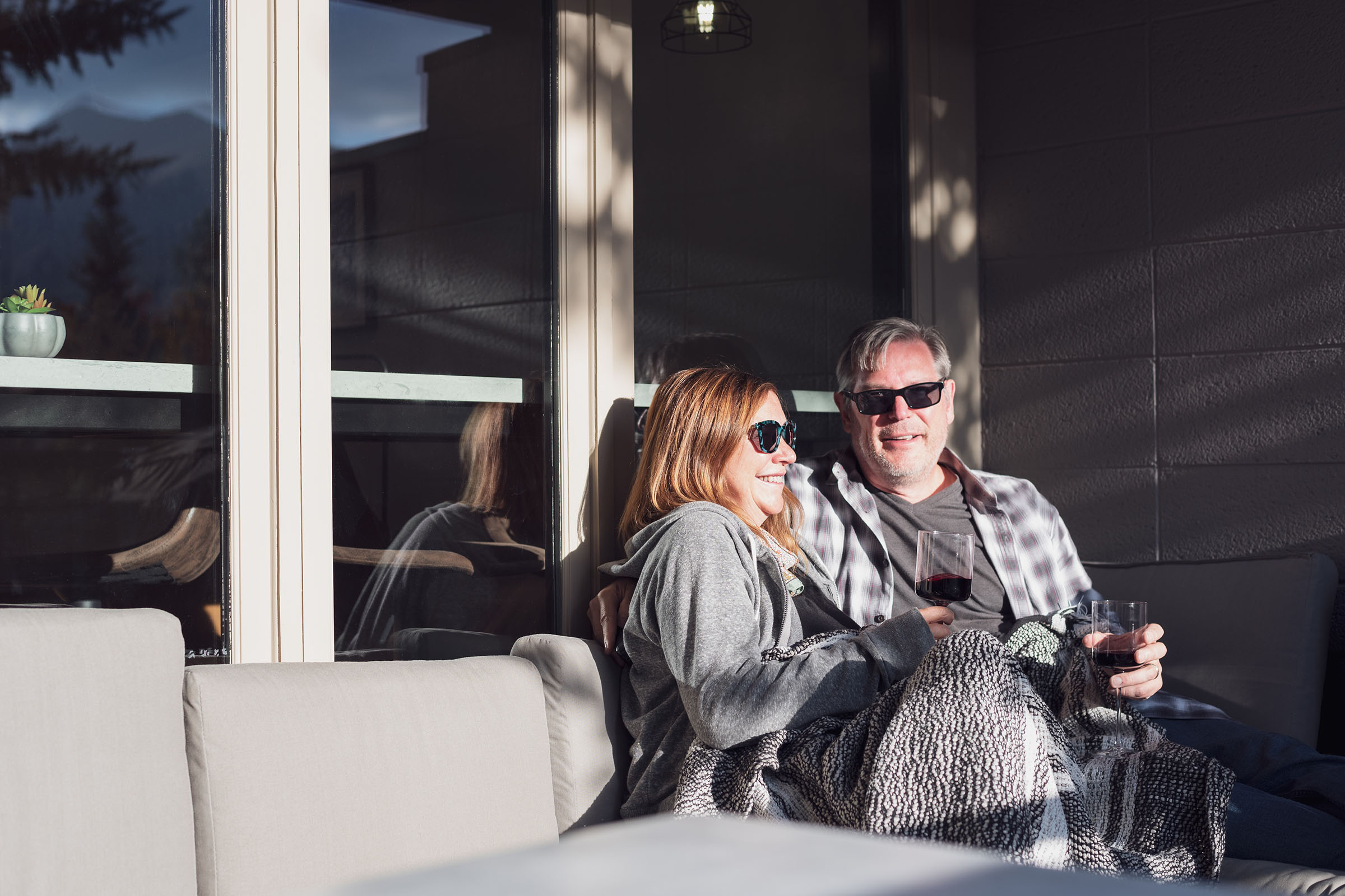 Parents sitting on veranda