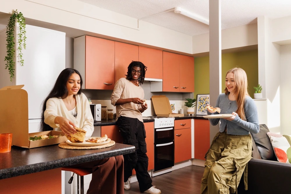 Students in a shared kitchen