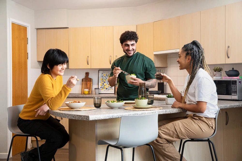 Students in a shared kitchen