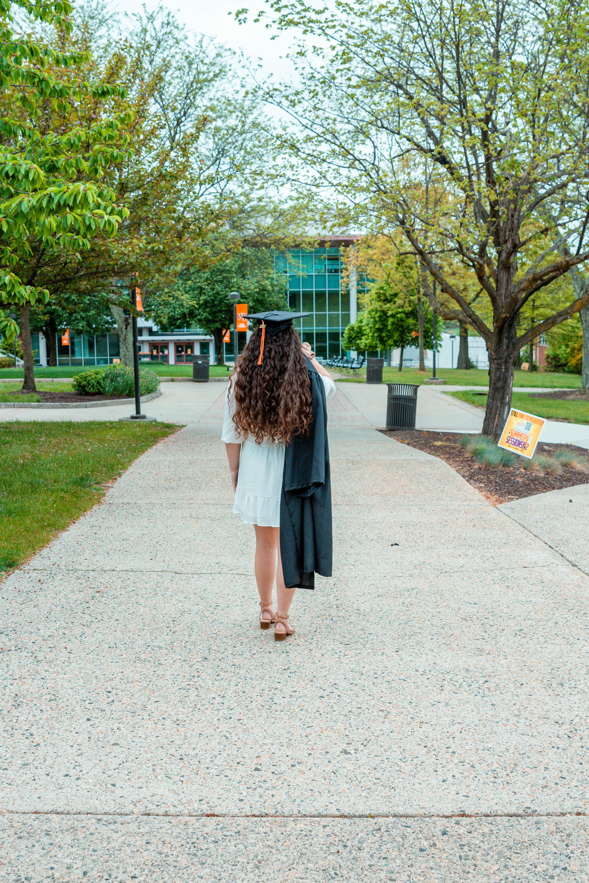 Girl stood with graduation hat on