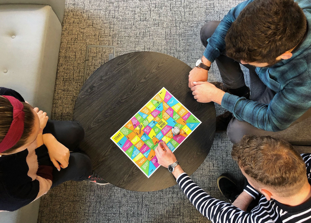 Students playing board game