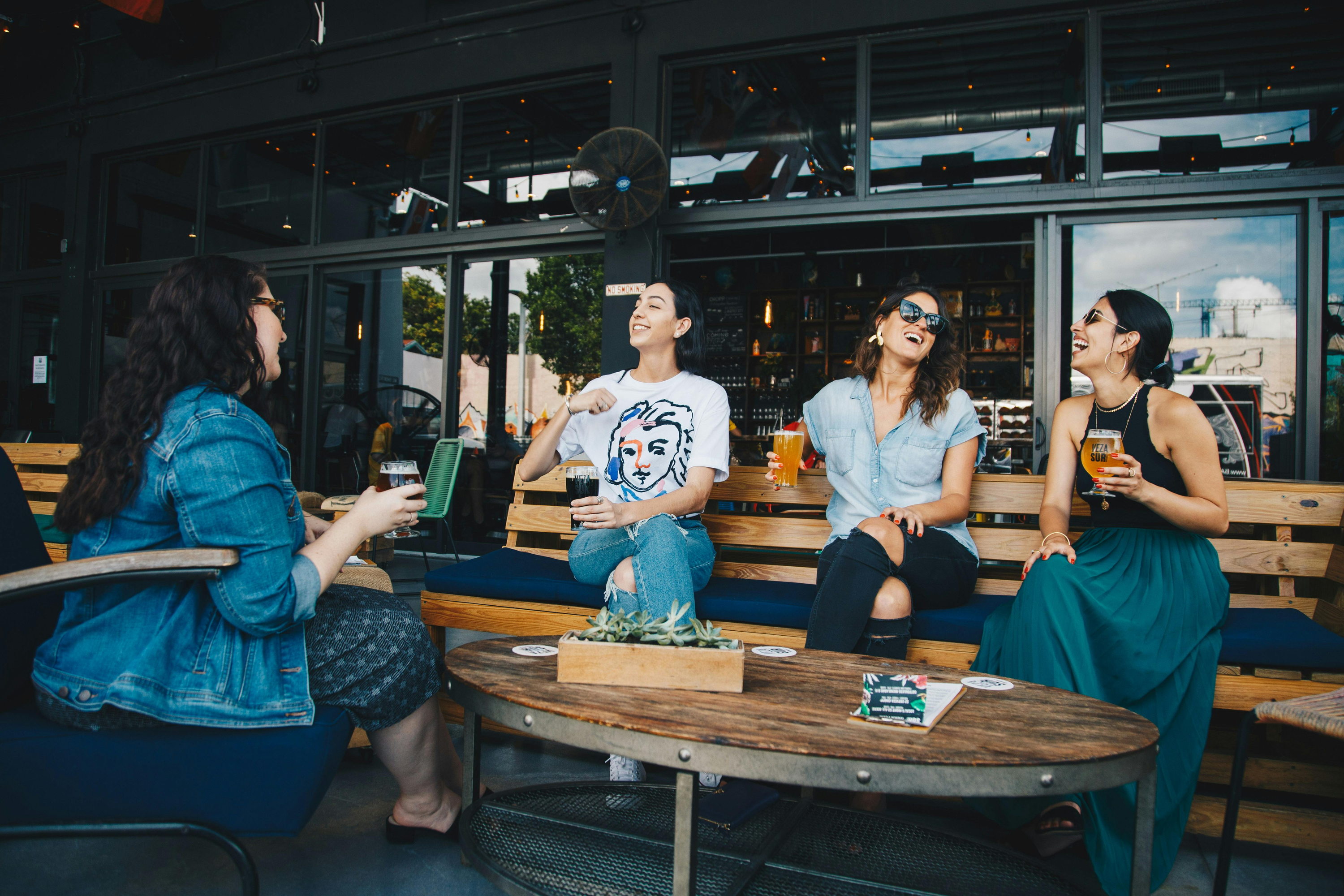 Four women at a bar