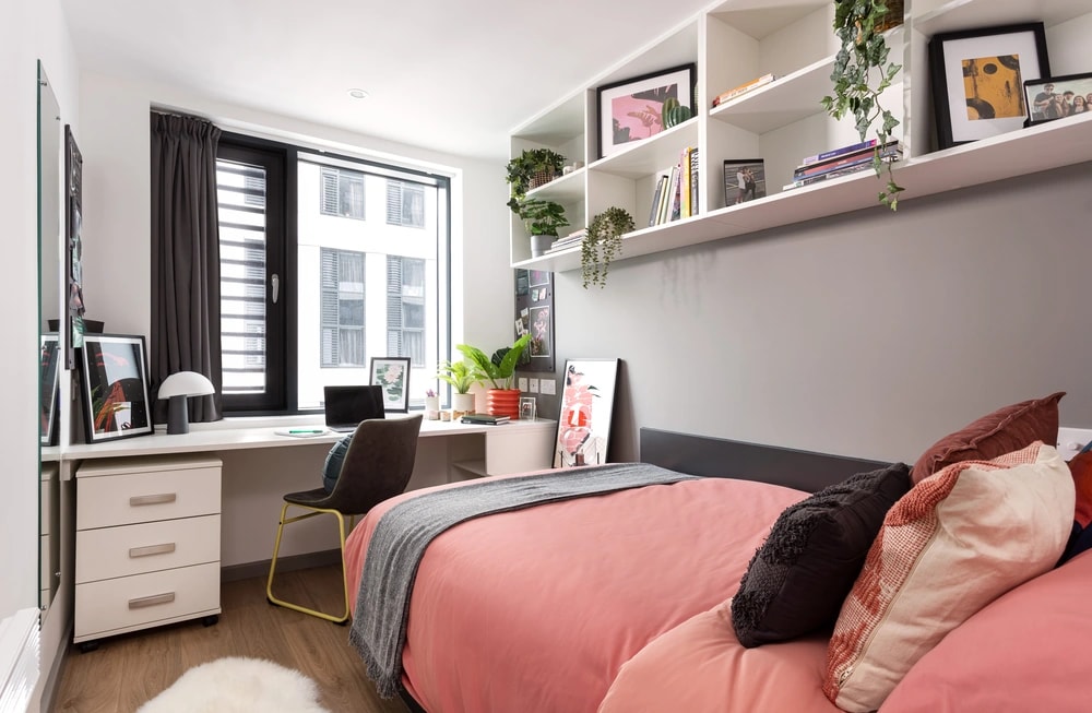 Bed and study space in an En-suite room