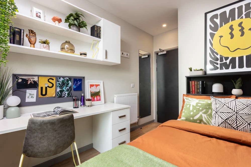 Bed and Desk in Access Two Bed Flat