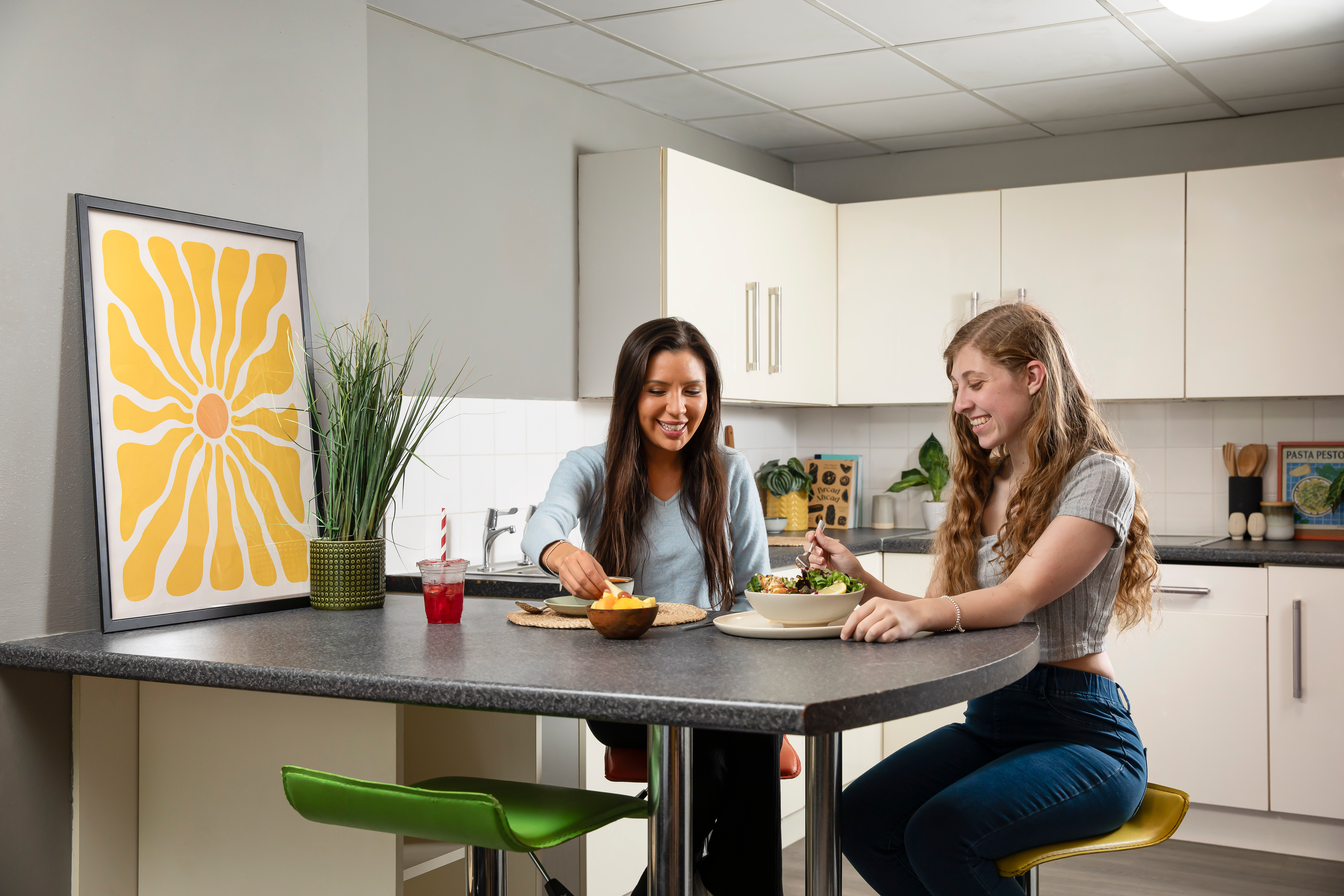 Students in a shared kitchen