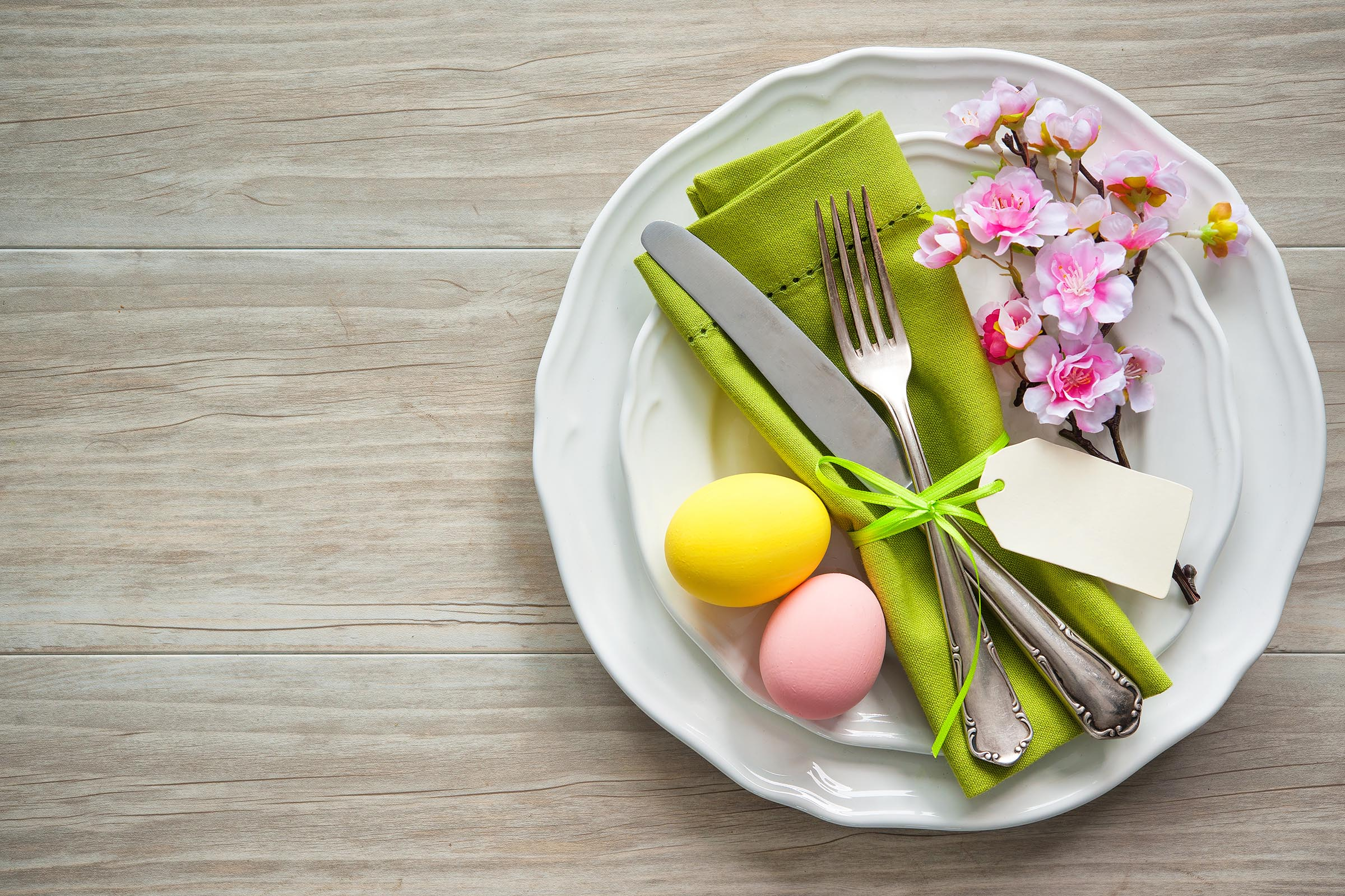 Plate with flowers, eggs, fork and knife